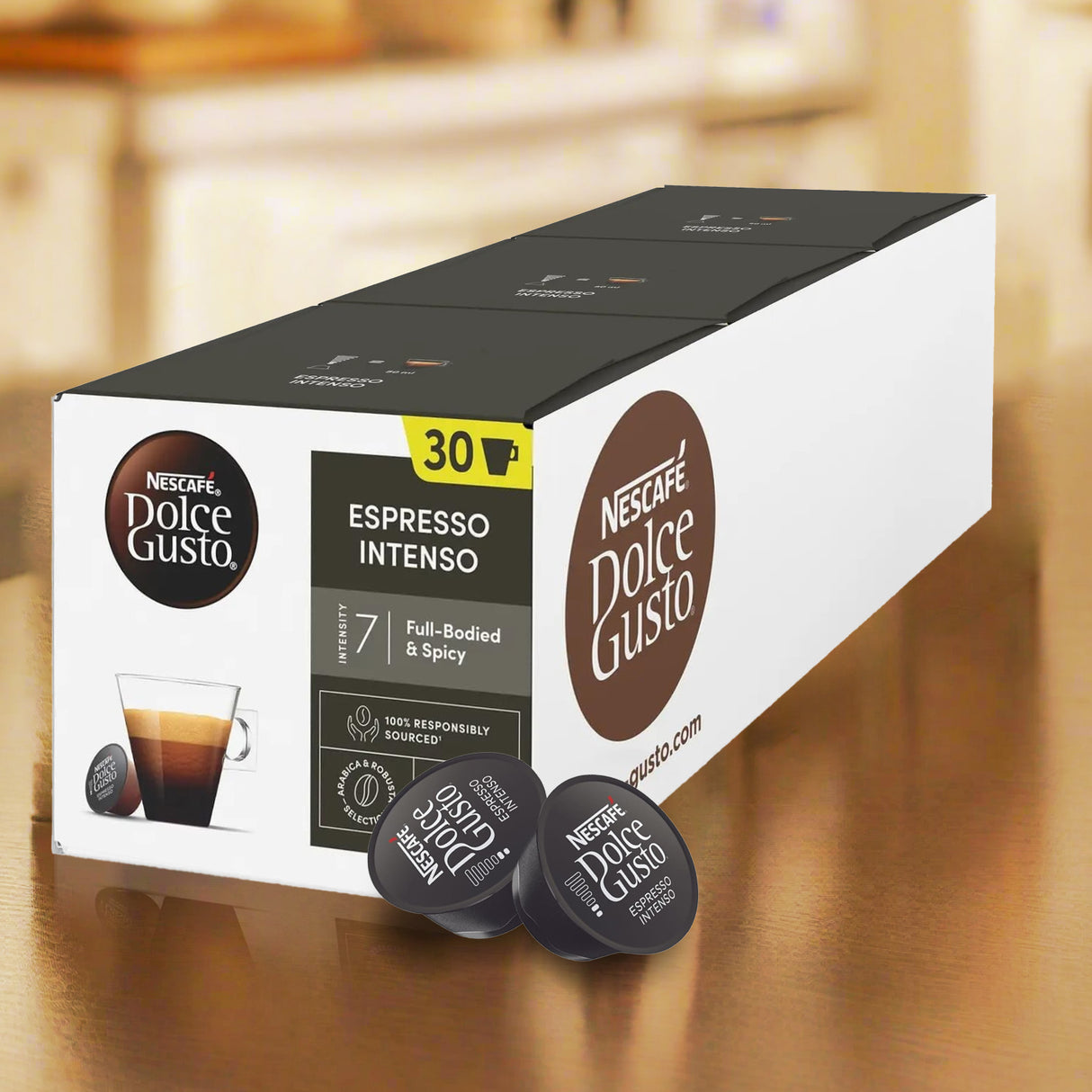 Box of Nescafe Dolce Gusto Espresso Intenso coffee capsules on a wooden surface.