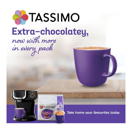 Tassimo coffee machine and Cadbury chocolate cups with a purple mug on a blurred background