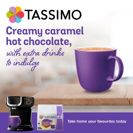 TASSIMO promotional image with a purple mug of hot chocolate, TASSIMO machine, and packaging.