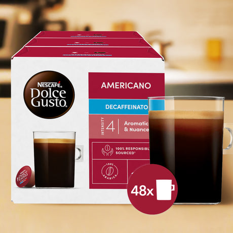 Nescafe Dolce Gusto Americano Decaffeinato coffee pod box with a glass of coffee on a kitchen background