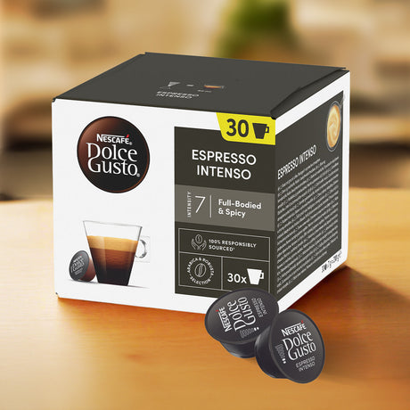 Box of Nescafe Dolce Gusto Espresso Intenso coffee capsules on a wooden surface