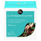 Nespresso Dolce Gusto coffee box packaging, featuring a white and teal design with a circular Dolce Gusto logo and a graphic of a hand picking coffee cherries.