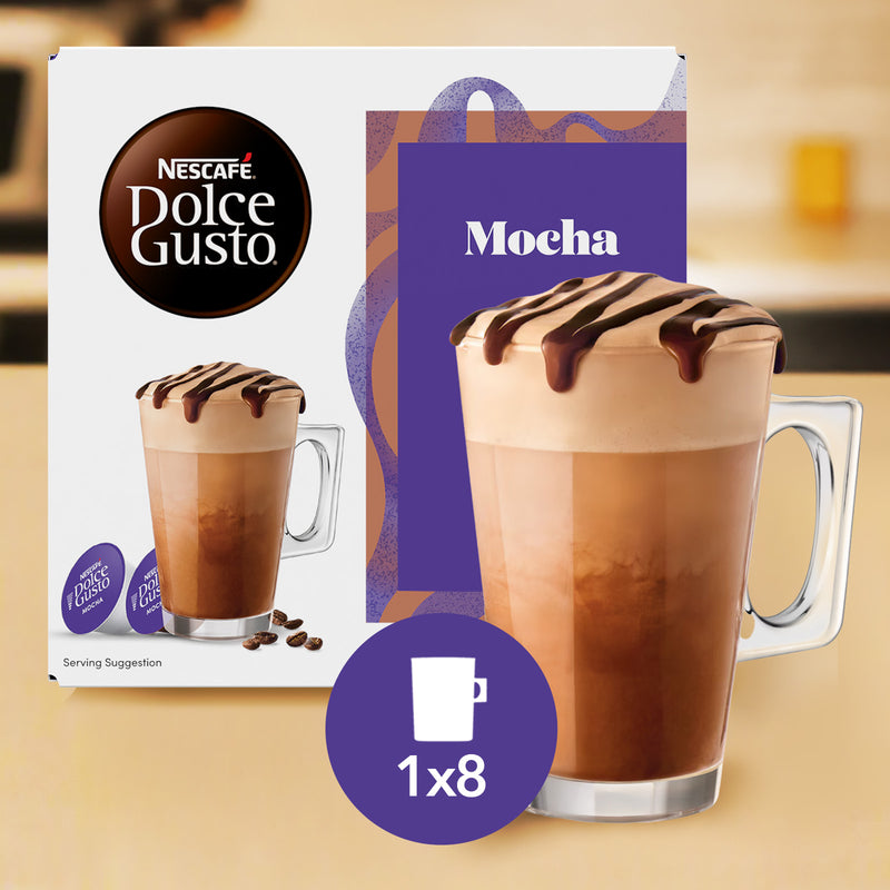 Nescafe Dolce Gusto Mocha coffee capsule pack shown with its box, a large glass mug filled with mocha latte, chocolate drizzle, coffee beans, and a purple badge indicating 1x8 capsules.