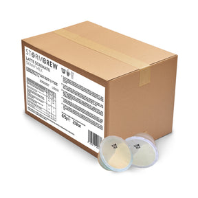 Cardboard box of Stormbrew coffee pods with two pods in the foreground on a white background