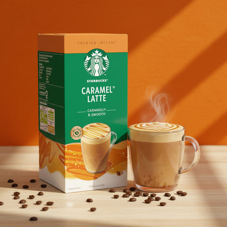 Starbucks Caramel Latte instant coffee packaging with a steaming cup of coffee on an orange background.